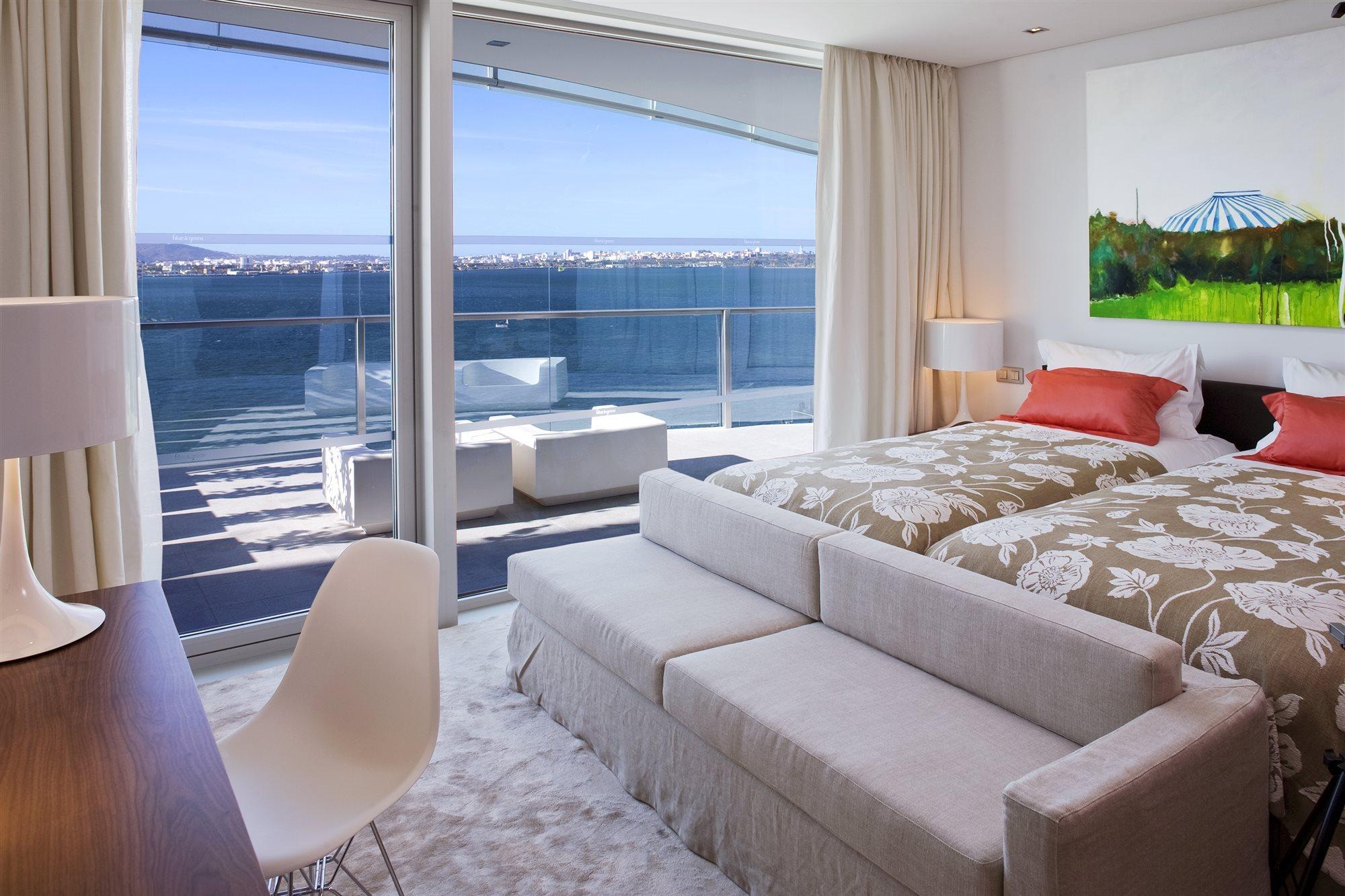 Troia Design Hotel Bagian luar foto A bedroom at the hotel